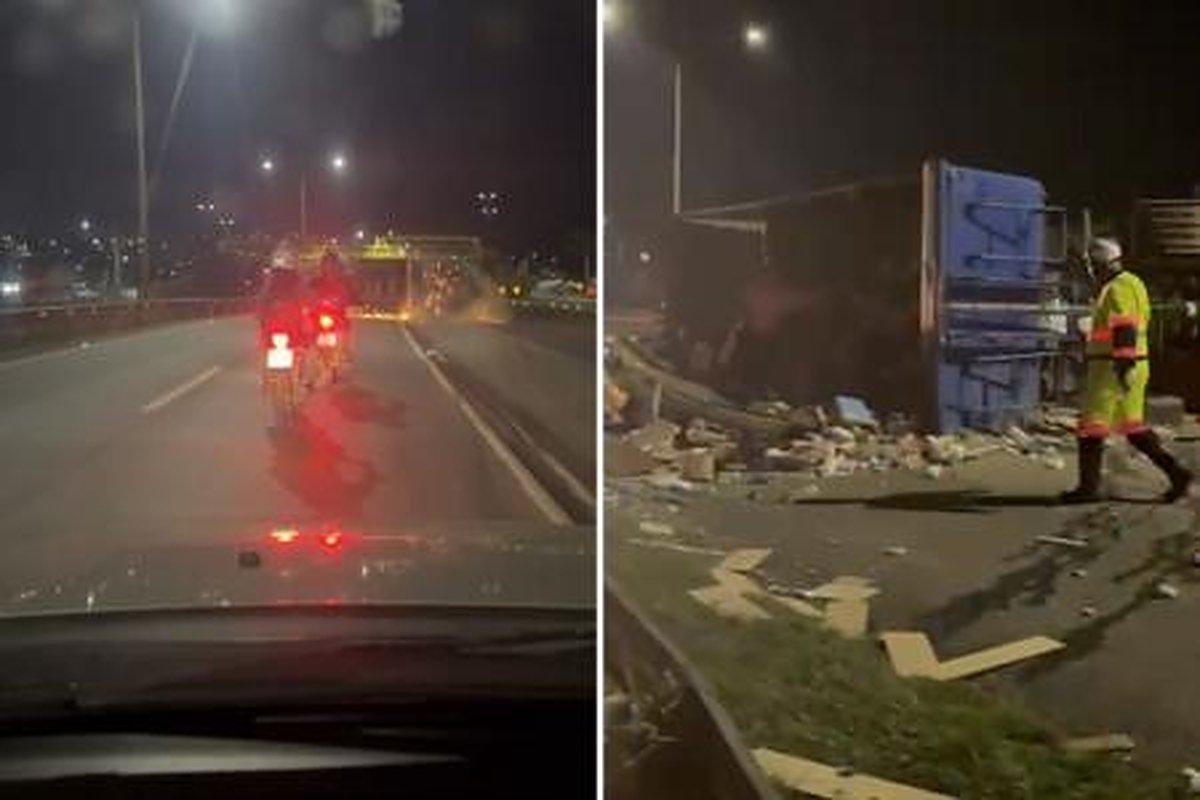 Vídeo - Caminhoneiro é preso após carreta tombar e espalhar entulho na BR-040