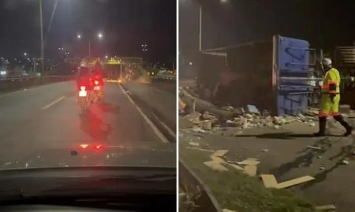 Vídeo - Caminhoneiro é preso após carreta tombar e espalhar entulho na BR-040